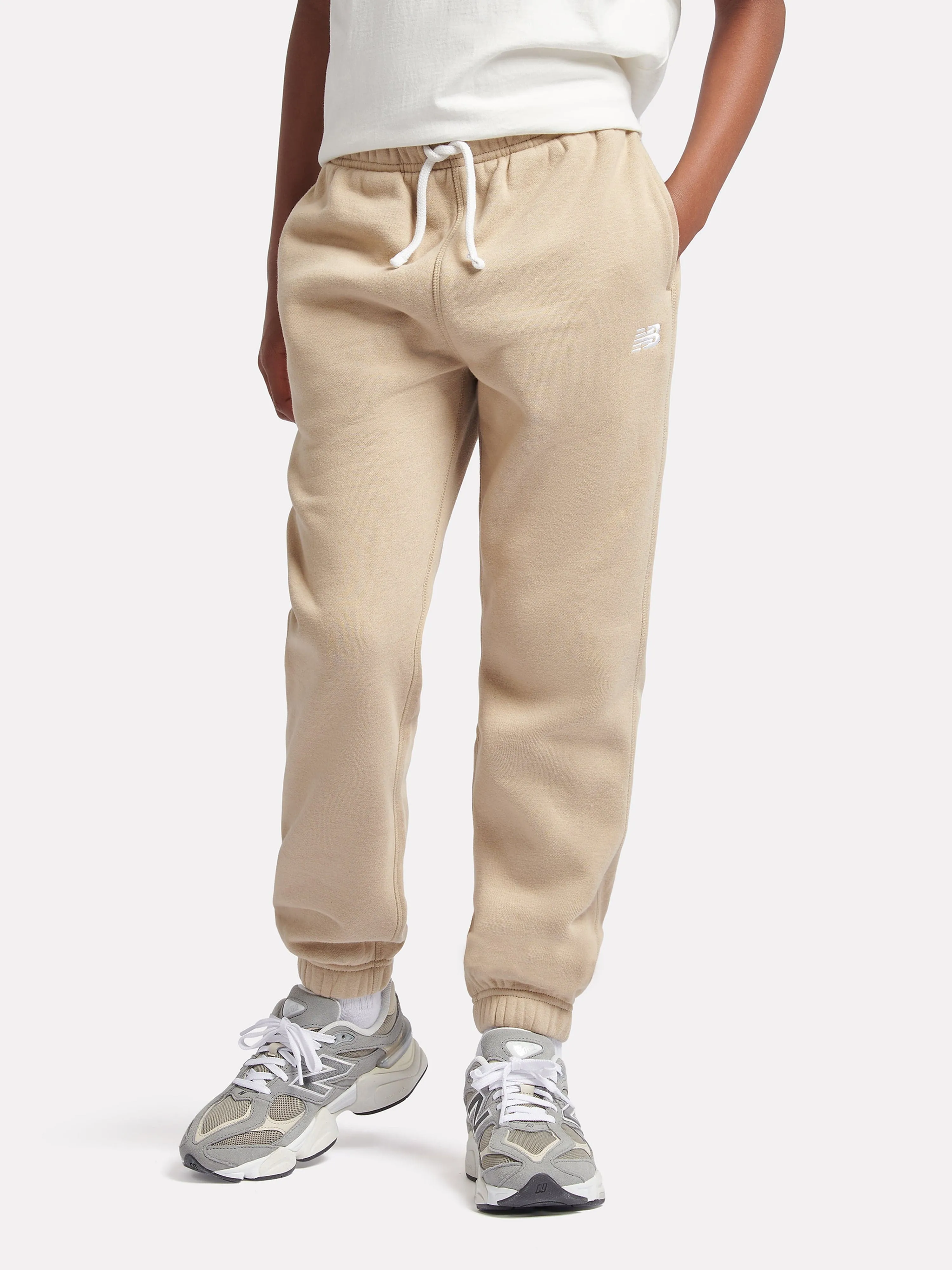 New Balance Boys Brush Back Small Logo Joggers in Beige